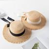 Korean version of elegant flat-top raffia straw hat for women's summer small fresh bow holiday beach big-brimmed sun hat