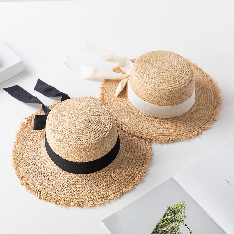 Korean version of elegant flat-top raffia straw hat for women's summer small fresh bow holiday beach big-brimmed sun hat