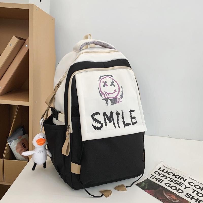 Schoolbag new student backpack casual large-capacity computer bag Korean version cute smiley face couple schoolbag manufacturer wholesale