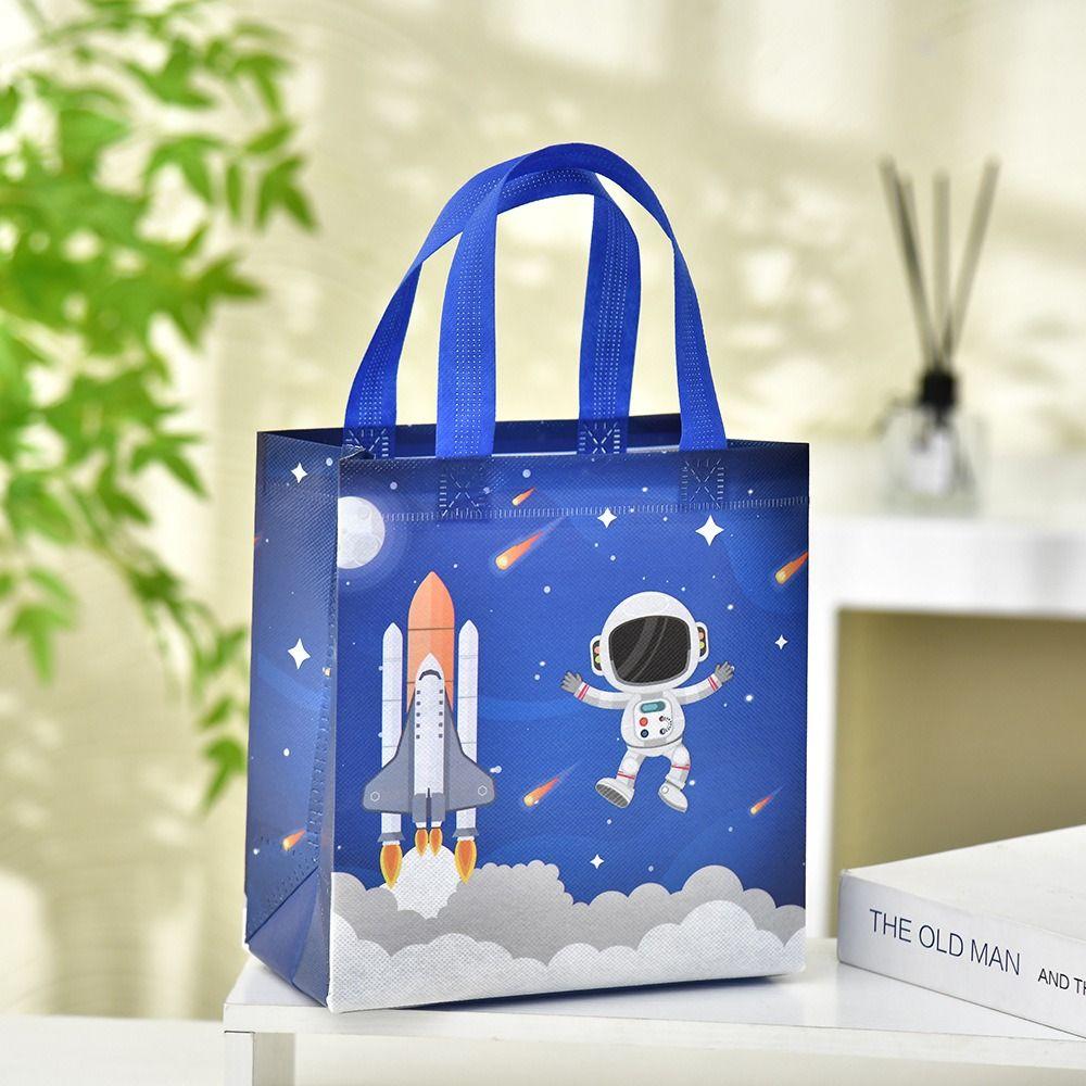 The New Non-woven Fabric Printed Handbag Cartoon Print Astronaut Toy Storage Backpack Large Capacity Candy Gift Bag