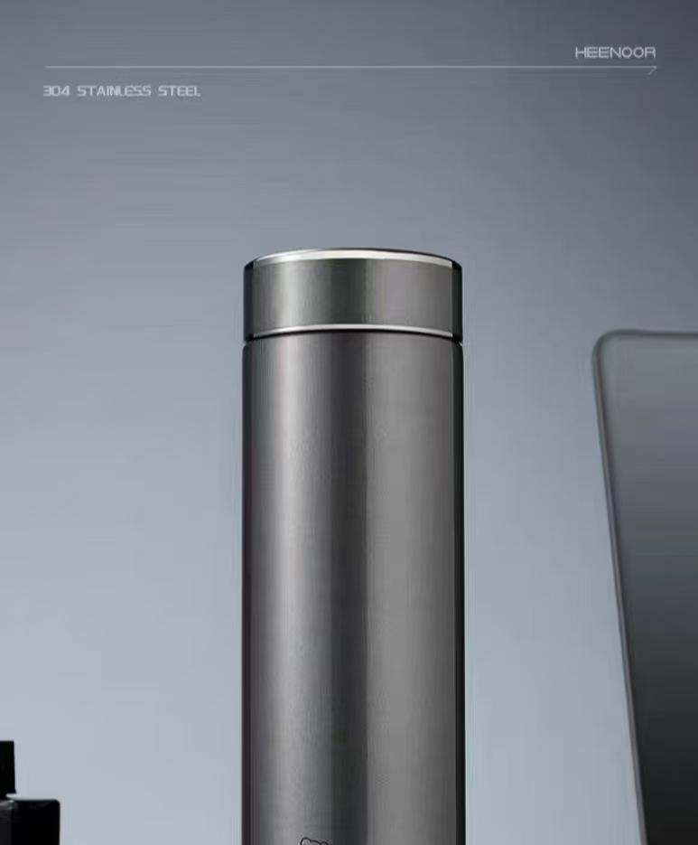 Xinuo Vacuum Insulated Water Bottle with Filter, Stylish for Men & Women - Perfect for Office, Car, Home.