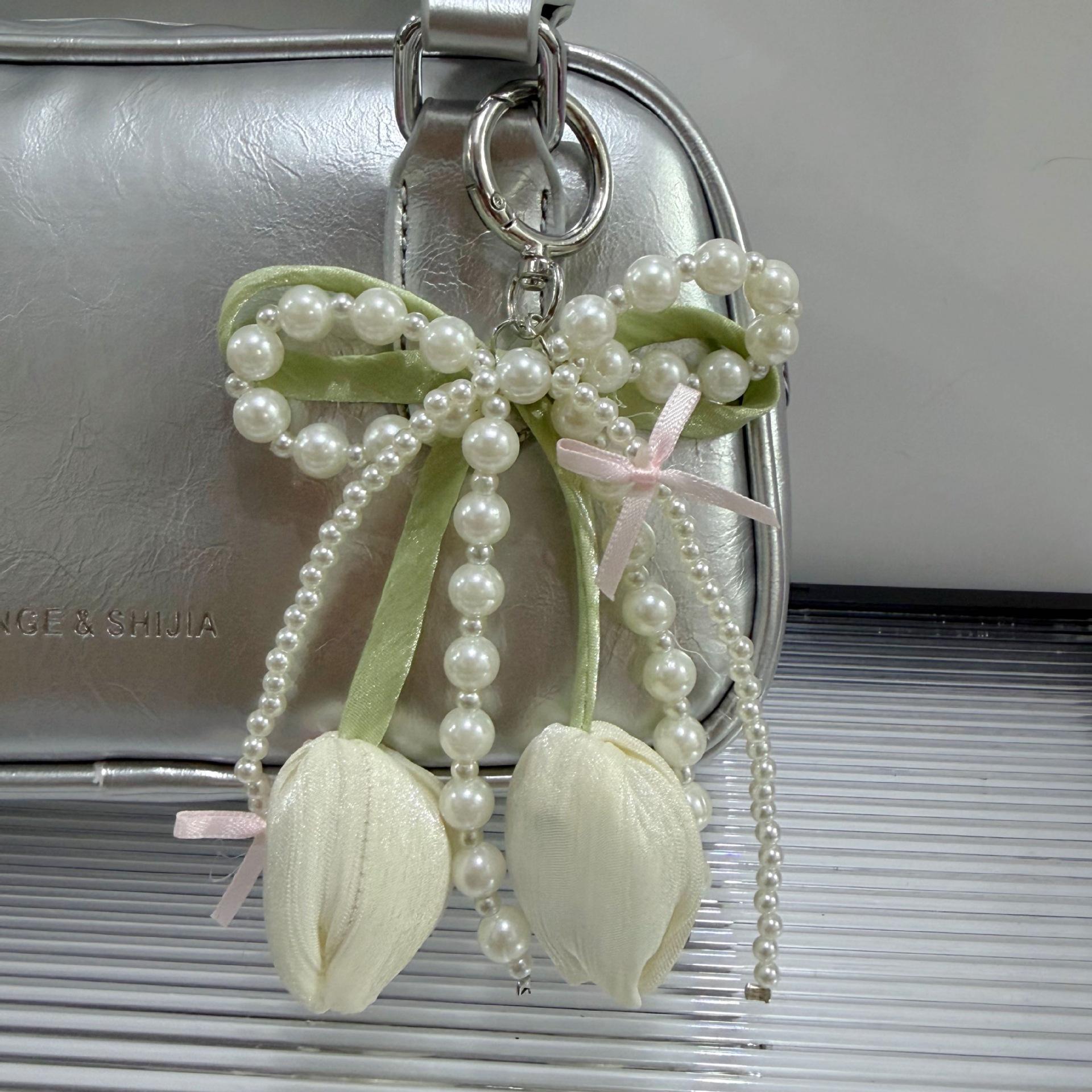 

Pearl Beaded Bow Bag Charm Keychain Accessory with Flower Pendant and Ribbon for Purse Decoration and Key Holder One Size