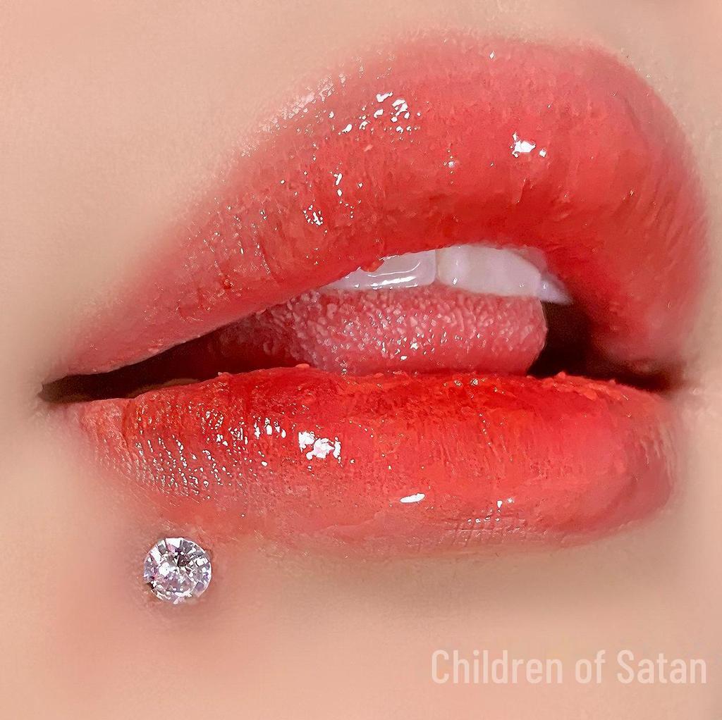 'Satan's Child: Luxury Diamond Lip and Ear Studs for Bold Women'