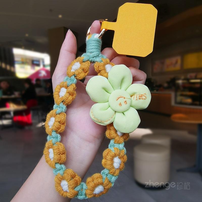 Smiley face flower woven mobile phone lanyard women's ins fragrant wrist short hand-woven boutique small fresh