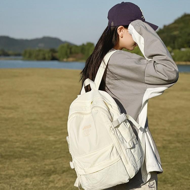 Schooltas Effen Kleur Eenvoudig Outdoor Stijl Rugzak Vrouwelijk Design Gevoel Niche Lichtgewicht Schooltas Kleine Rugzak voor Basisschool en Middelbare School