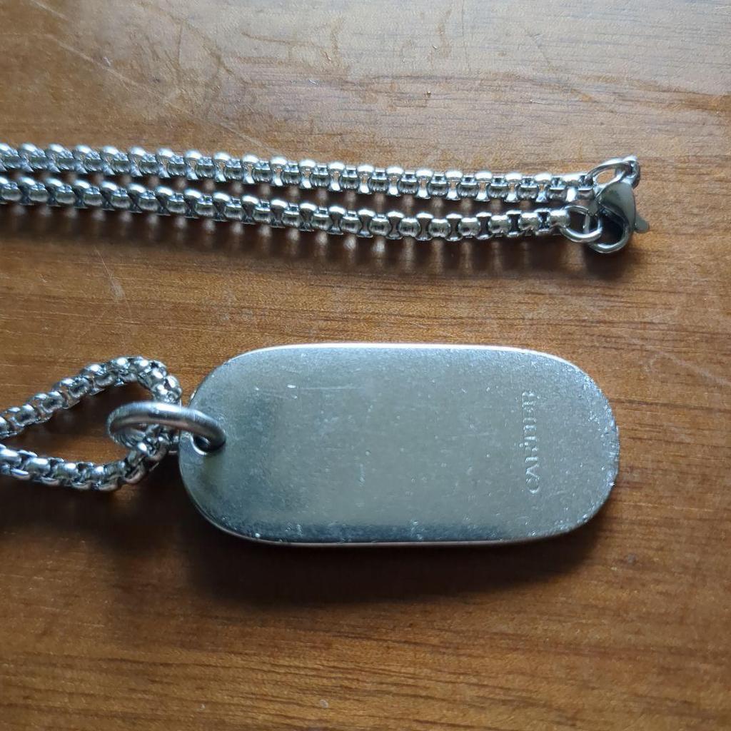 Used Cartier dog tag necklace
