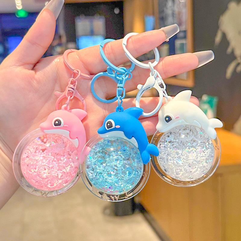 2025 New Oil Flowing Sand Dolphin Keychain: Cute Marine Animal Backpack Pendant for Girls