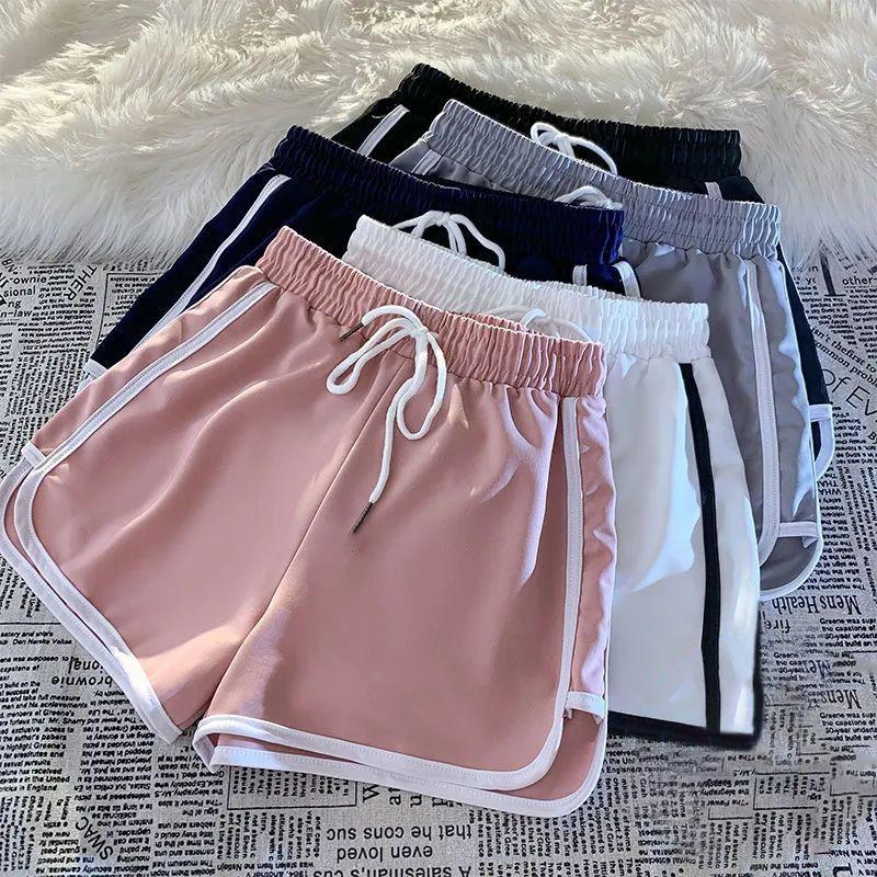 

American casual sweet and spicy trend sports breathable shorts women s summer ins simple and versatile loose three-point super shorts XXL рожевий