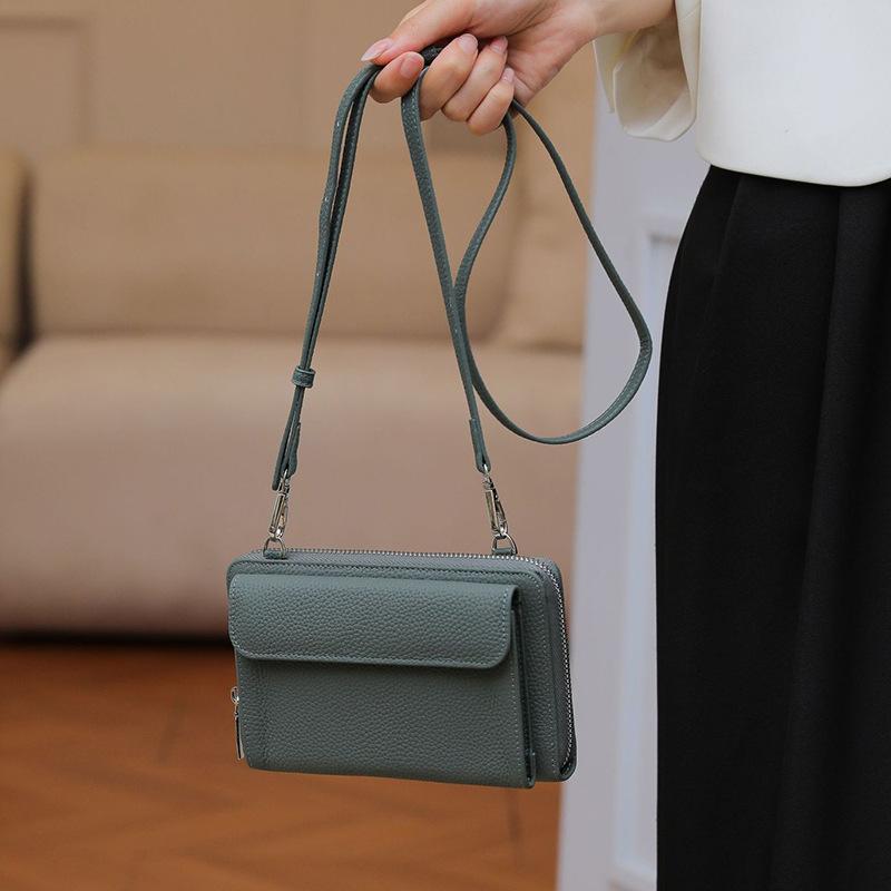 First layer cowhide shoulder messenger bag New women's mobile phone bag Simple and fashionable key bag Small square bag