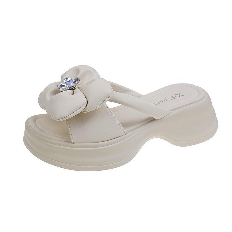 Thick-soled cool slippers women's fashion outer wear 2024 summer foreign trade new casual flower one-word muffin sole beach shoes
