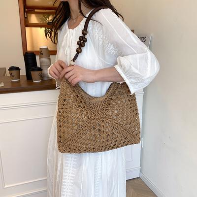 Sommer-Modetasche Damen 2025 neu Strandtasche Hohl-Schultertasche Tragbare gewebte Tragetasche