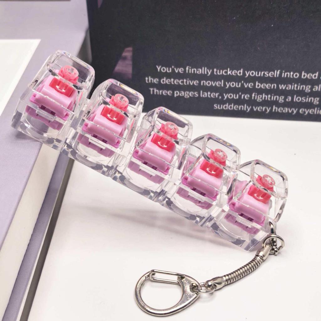Stummer mechanischer Tastatur-Schlüsselanhänger mit 5,6 Kreuzachsen-Tasten und hochtransparenten Tastenkappen; Dekompression Spielzeug.