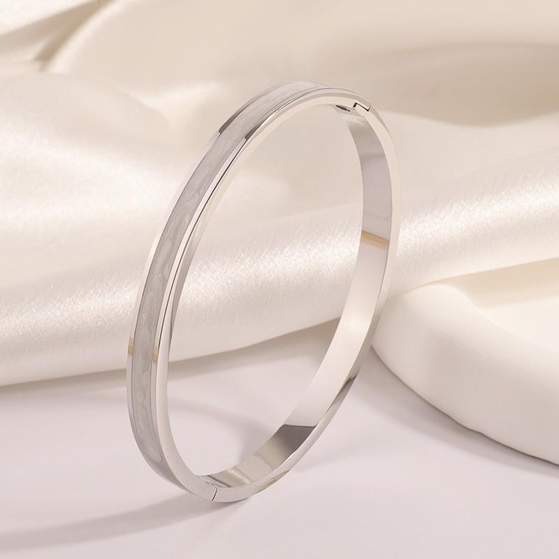 Titanium steel bracelet, European and American fashion enamel drip bracelet, girls' high-end k real gold electroplated bracelet