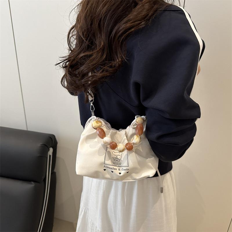 Damentasche Perlenhandtasche neu vielseitig schlicht Nische Pendler Schulter Crossbody Eimertasche