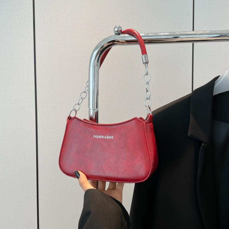 

2025 new foreign style casual popular fashion handbag retro personality niche design beautiful shoulder crescent bag красный