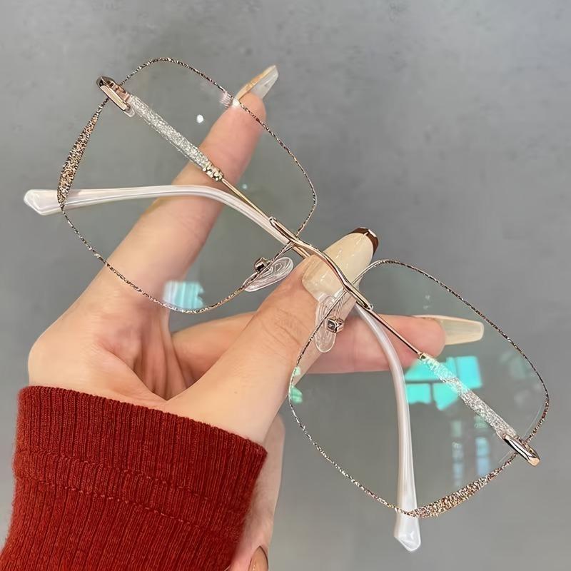 A Pair Of Frameless Transparent Lenses For Women With A Sparkling Galaxy Frame