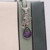 Natural Stone Crystals Teardrop Shape Photo Locket Keychain Featuring Diamonds Cut Designs for Sentimental Gifts