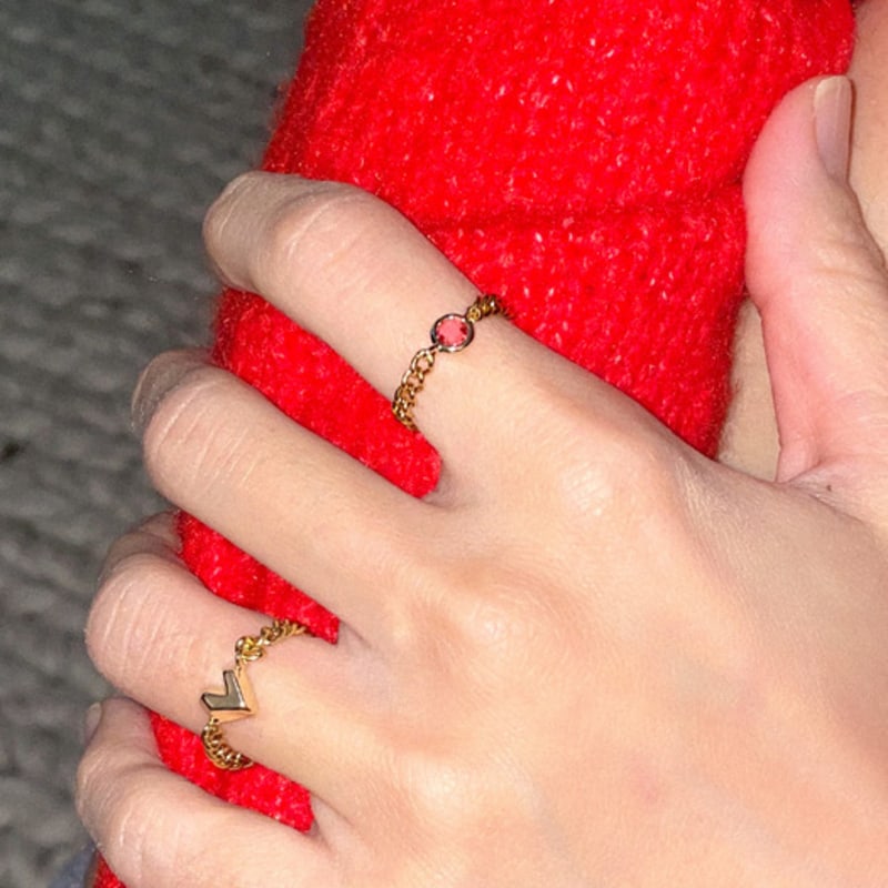 

MERRYMOTIVE Red crystal pendant surgical chain ring No. 17