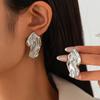 Trendy Alloy Studs Earrings with Distinctive Geometric Pattern Perfect for Women Who Love Statement Jewelry