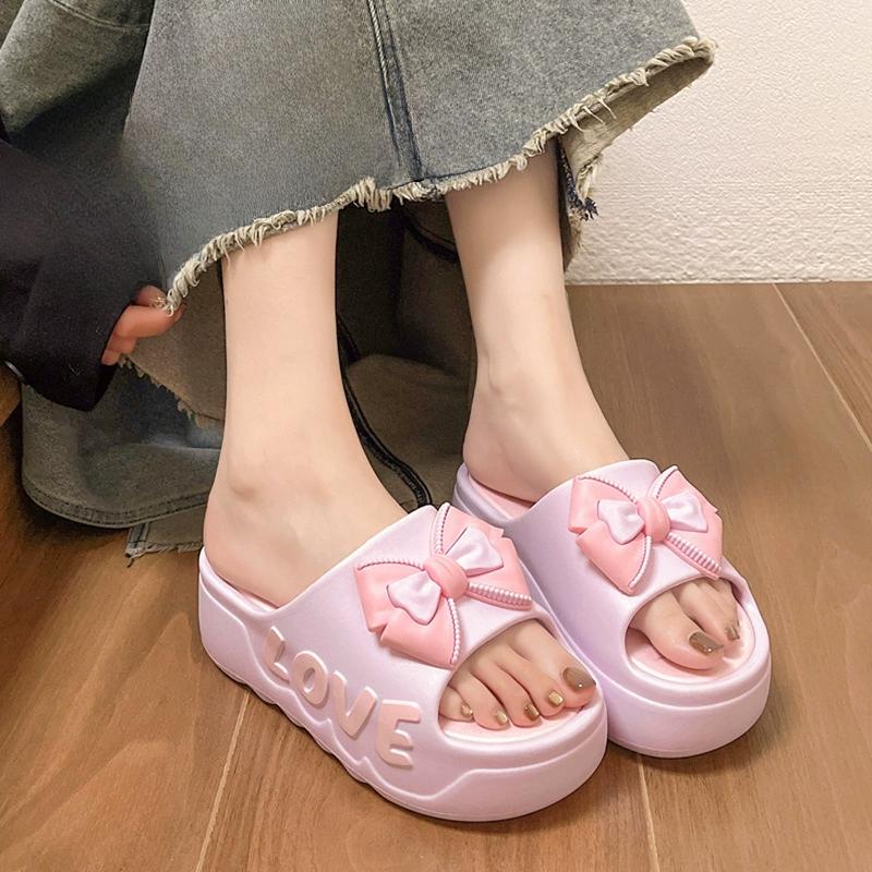 Шлепанцы на толстой подошве для женщин на лето модные для домашнего использования в помещении с бантом увеличивающие рост крутые шлепанцы для ванной противоскользящие для ношения на улице 3839 1498₽
