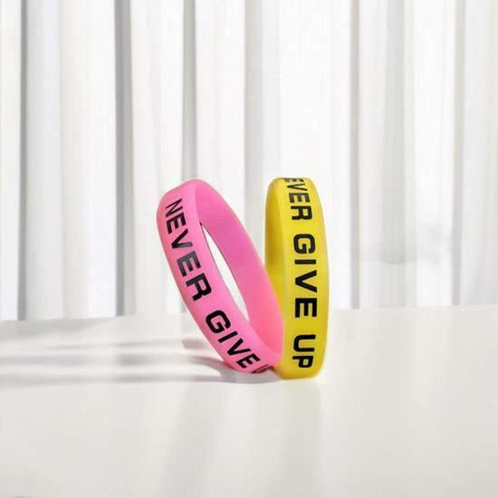 Five-Color Silicone Inspirational Bracelets - 'Never Give Up' - Available In Yellow, Pink, Blue, and Green.