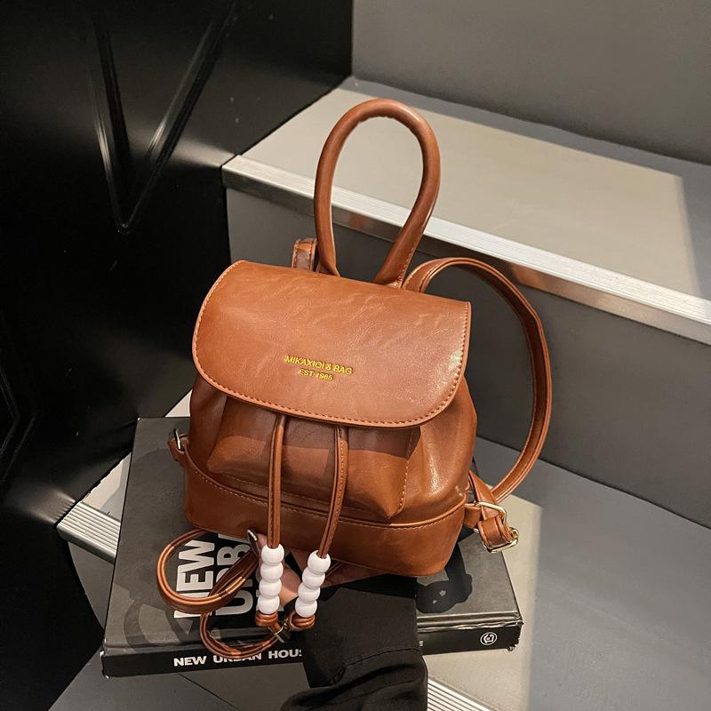 Trendy simple backpack new drawstring pleated women's bag going out travel small backpack