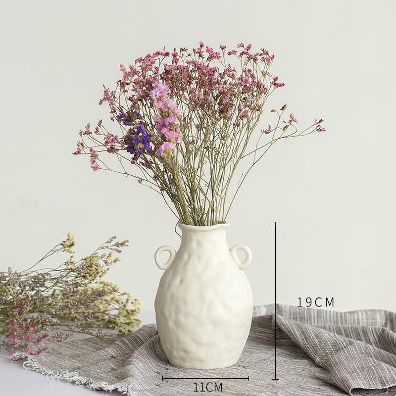 White Ceramic Vase with Dried Baby's Breath for Living Room or Dining Table Decoration
