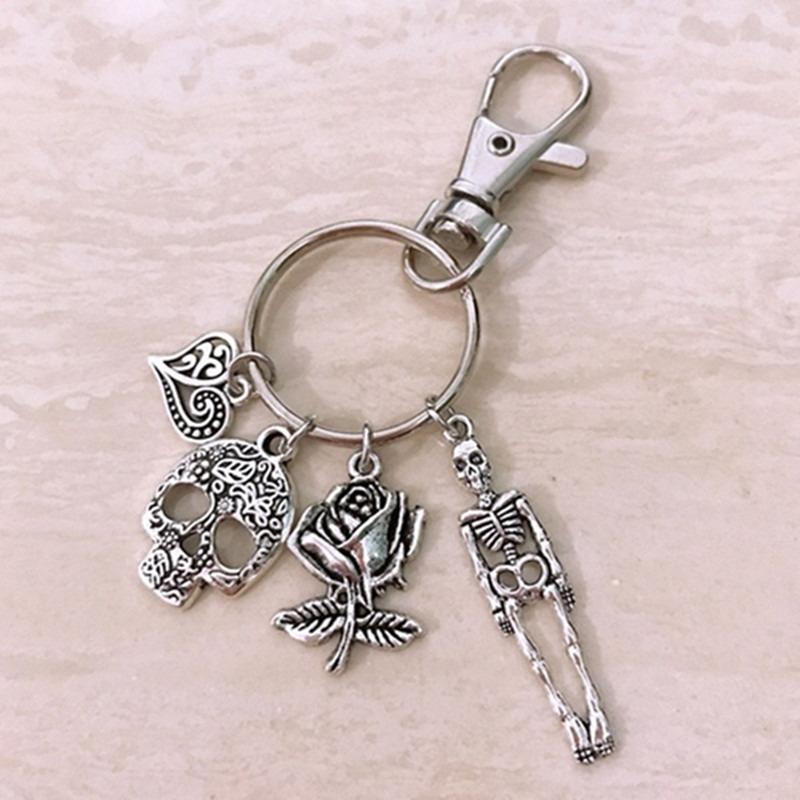 

Gothic Skull Keychain with Heart and Rose Design
