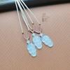 White Chalcedony Agate Pendant Necklace with Golden Branch and Jade Leaf Design