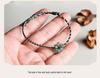 A-Qualität Blauer Jade-Orchidee Handgewebtes Unisex-Armband