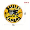 "Smile! You're On Camera" Sign. 7.8" Round Yellow Surveillance Design for Home, Office or Garage.