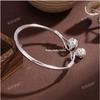 Silver-Plated White Copper Hollow Palace Bell Bracelet - Elegant Retro Open Cuff Bangle, Perfect Gift for Girlfriend, Stylish Niche Design.