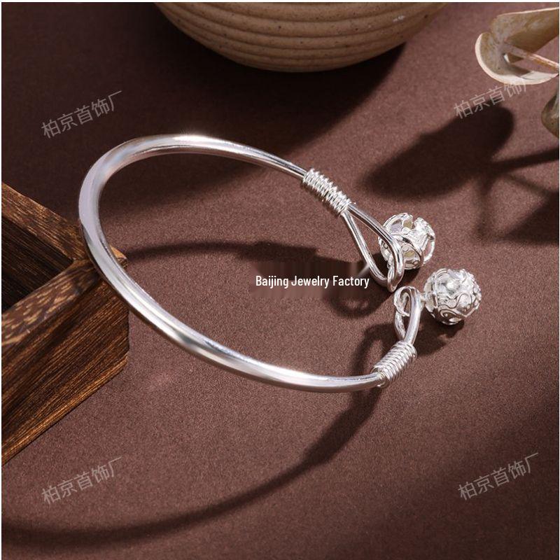 Silver-Plated White Copper Hollow Palace Bell Bracelet - Elegant Retro Open Cuff Bangle, Perfect Gift for Girlfriend, Stylish Niche Design.