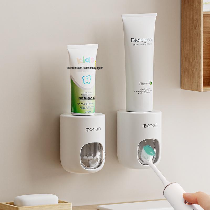 

Настенный автоматический дозатор зубной пасты с пылезащитной крышкой и выдавливателем белый