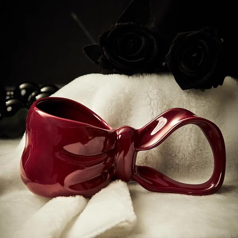 Keramik Schmetterling Schleife Langhenkelbecher