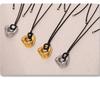 Qiong Yao Stainless Steel Curved Pendant Necklace with Black Leather Cord, Adjustable Length, Simple High-End Design for Women.