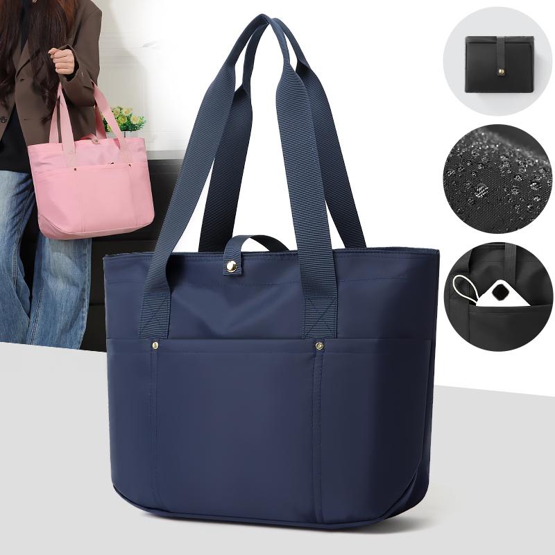 Women's portable folding storage bag with multiple compartments and adjustable shoulder strap for large capacity.