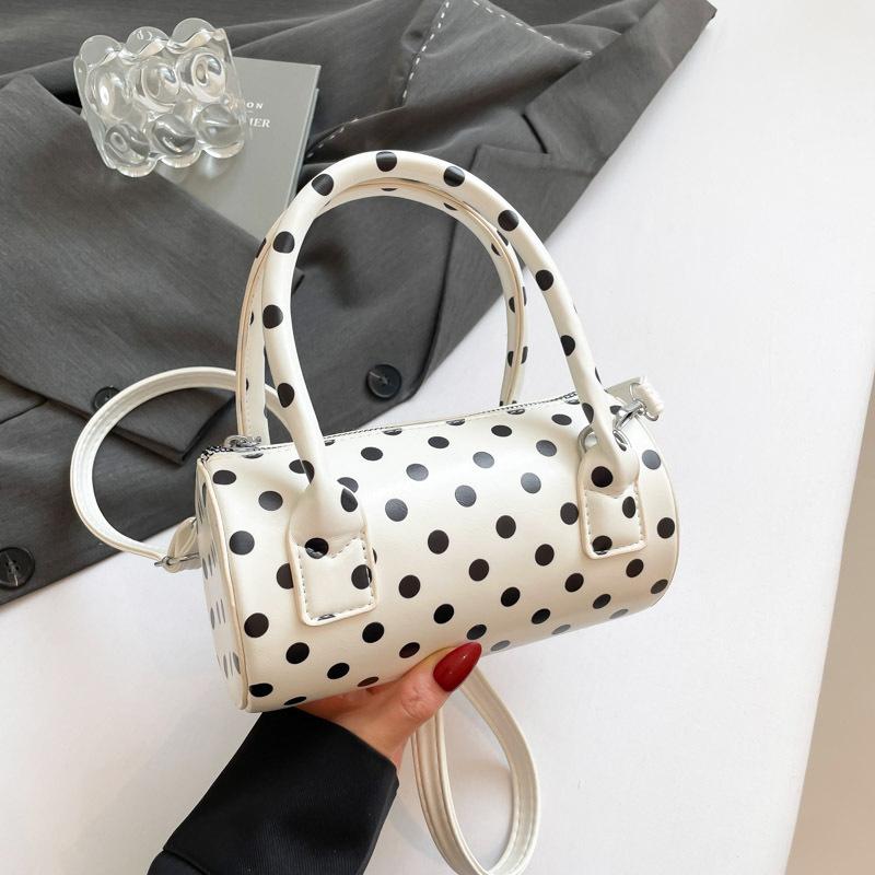 Niche polka dot bag women's 2025 new fashionable versatile underarm messenger bag exquisite portable small bag cylindrical bag