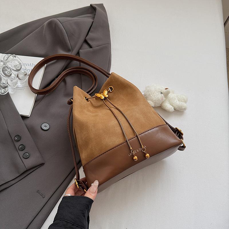 Bucket bag One shoulder messenger bag Women's autumn new niche women's bag Drawstring dual-purpose small backpack