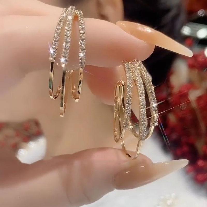 New Women's Light Luxury C-shaped Three Life Three Year Earrings Fashionable Exaggerated Atmospheric Circle High End Earrings