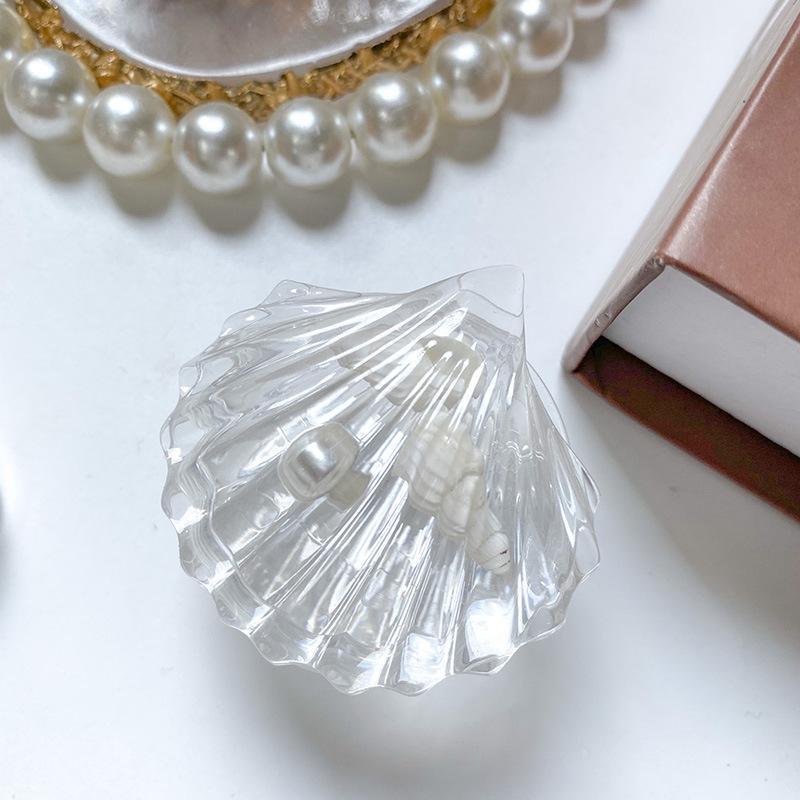 

Simulation Transparent Shell Mobile Phone Airbag Bracket Conch Pearl Paste Retractable Portable Desktop Lazy Support Frame