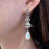 **Empress Dowager Saturn Pearl Earrings - Luxury Fashion Statement**