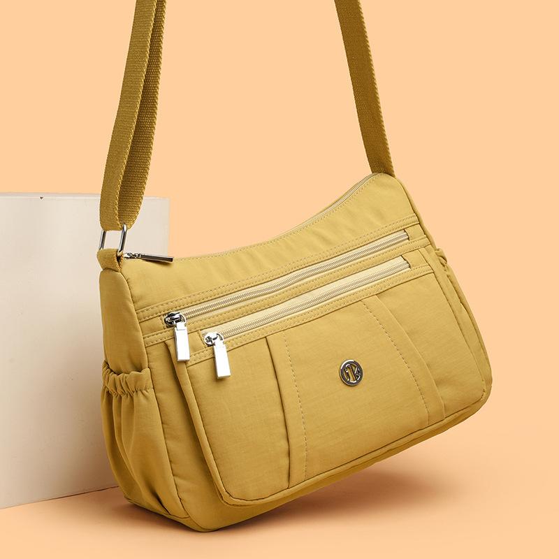 Single-shoulder Bag - Stylish and Simple Backpack with Multiple Functions for Travel, Featuring Multiple Compartments and A Small Square Shape.