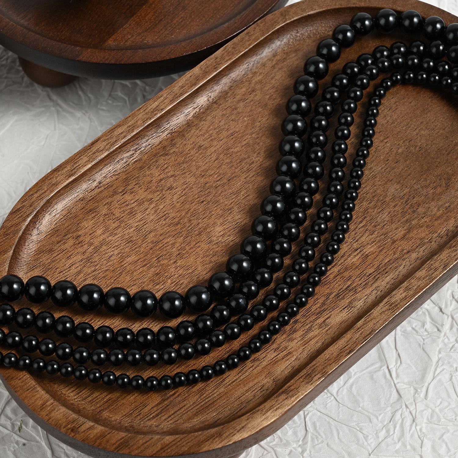 

Высокоглянцевые жемчужные бусины из черного стекла класса А, 10 мм, для украшений и аксессуаров 10mm (approx. 100 beads/strand) чёрный