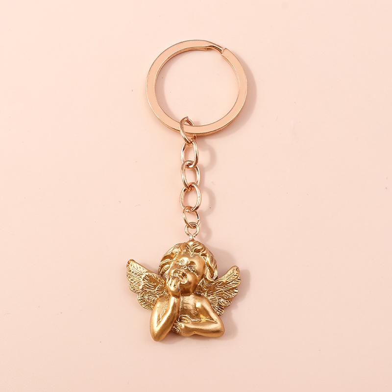 

Cute Resin Angel Keychain Mini Musical Instrument Key Ring Pendants for Car Keyholder Handbag Decor Jewelry Gifts for Girls