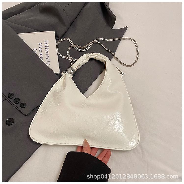 

Сумка подмышку женская 2025 новая с высоким чувством женская мода универсальный нишевый дизайн взрыв интернет-знаменитости наплечная сумка