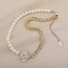 French Retro Camellia Pearl Necklace with Asymmetrical Rhinestone Chain – Elegant Neck Accessory
