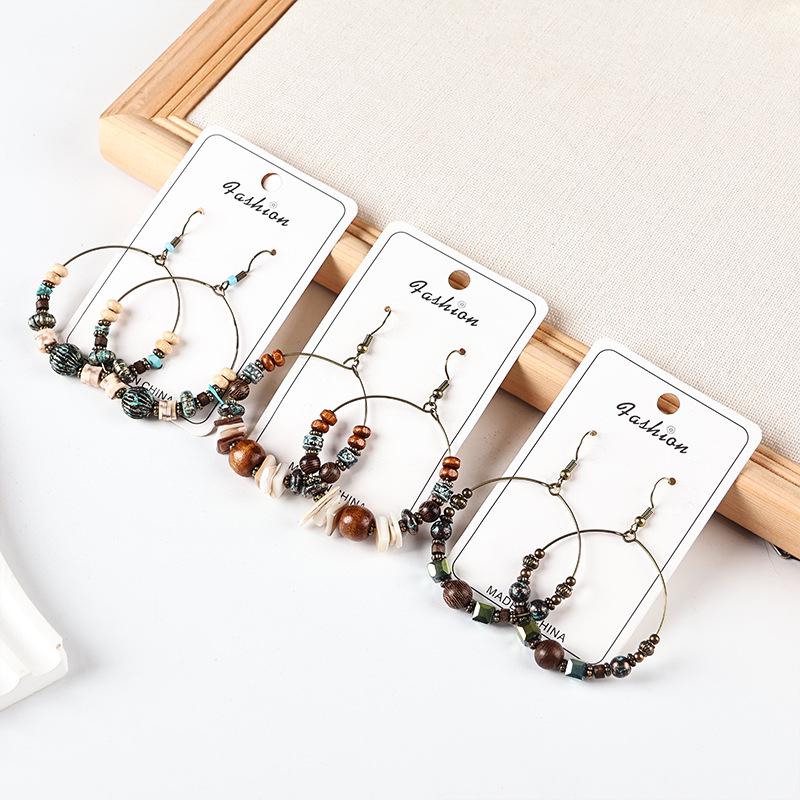 Retro Ethnic Bronze Hoop Earrings with Wood Beads and Tassels