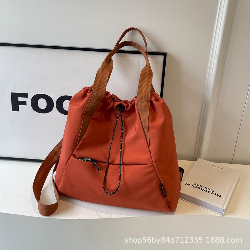 Fashion and leisure large-capacity tote bag women's 2025 spring portable versatile canvas bag multi-pocket shoulder bag