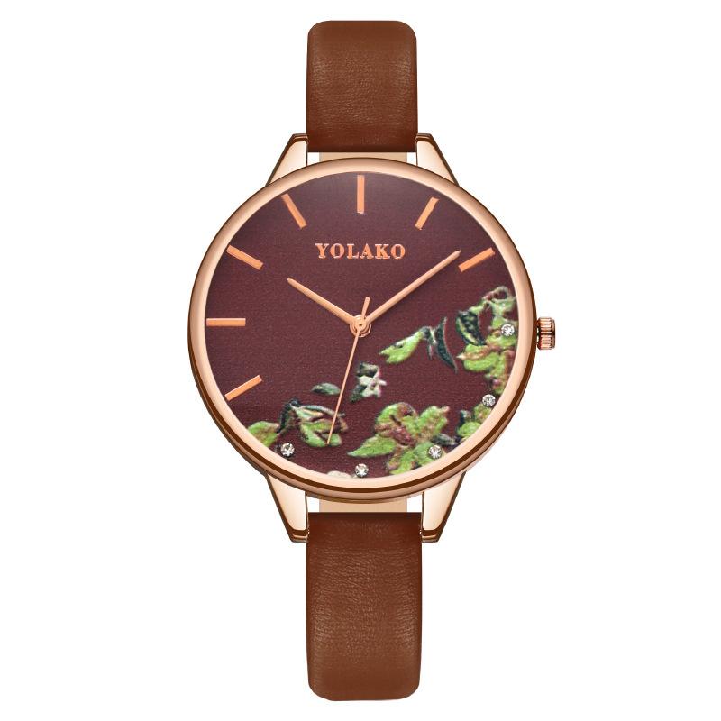 

Гаряча розпродаж модних модних жіночих годинників. Жіночий годинник з кварцовим поясом темно-коричневого кольору